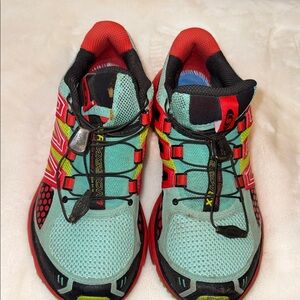 Salomon Athletic Shoes in Red, Green, and Black